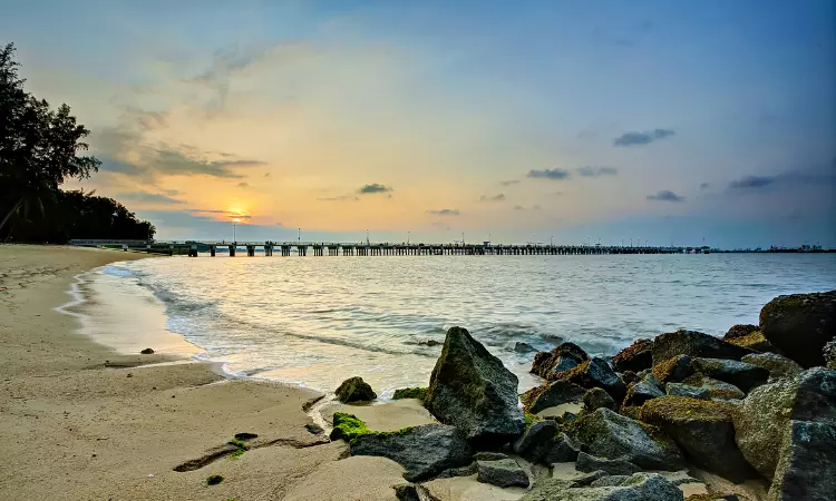 A beautiful sunset view from the coast of Changi Beach Park.