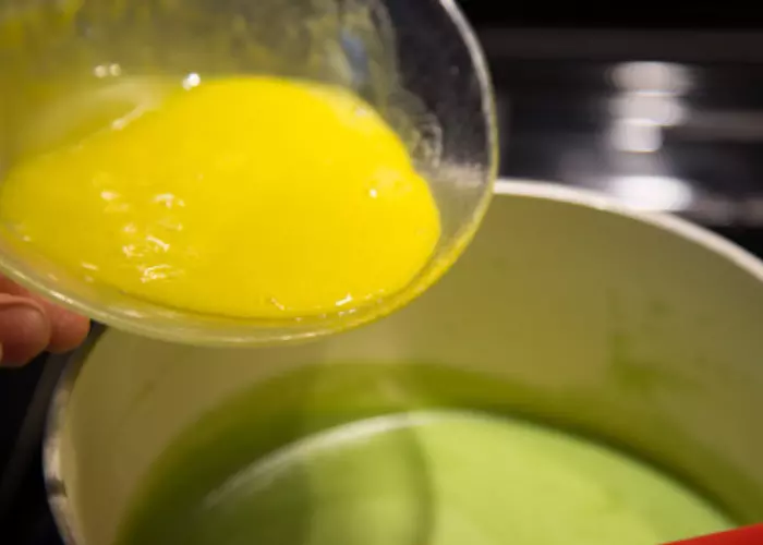 Temper the egg yolks